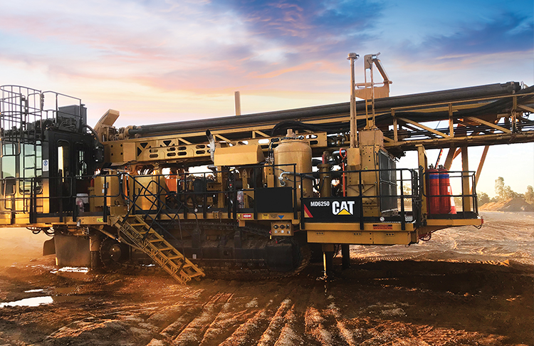 Large mining equipment operating on a mine site